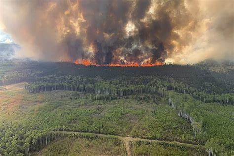 Local officials announced on Tuesday that a significant wildfire is steadily advancing towards Fort McMurray, a major Canadian city known for its oil sands industry.